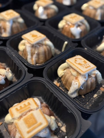 Banana pudding mini bundts boxed individually for an event